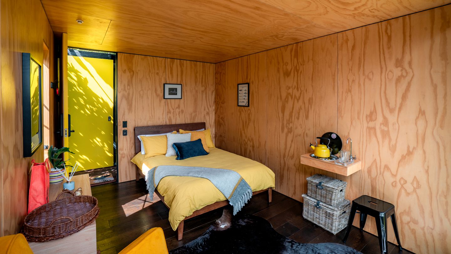 Gorgeous Romantic Tiny Hut Nestled Among the Towering Trees in NZ
