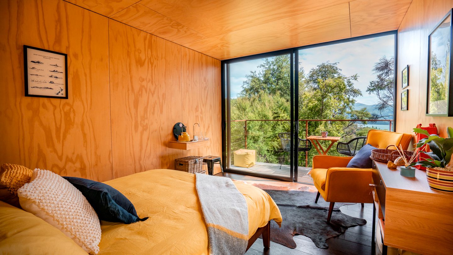 Gorgeous Romantic Tiny Hut Nestled Among the Towering Trees in NZ