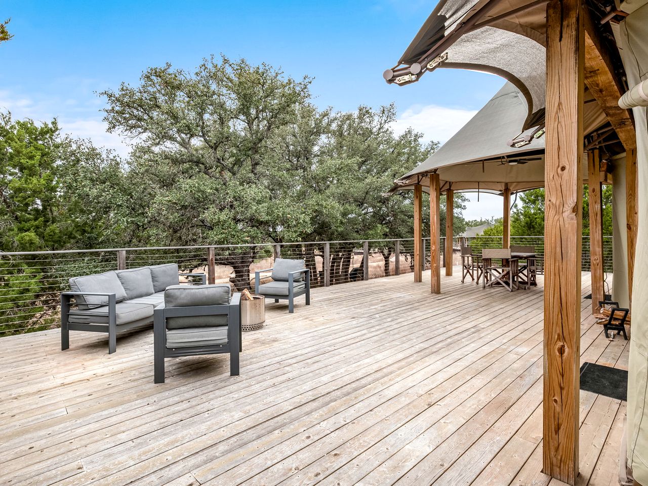 Luxurious Glamping Lodge with Wrap-Around Deck for an Amazing Getaway in Stonewall, Texas
