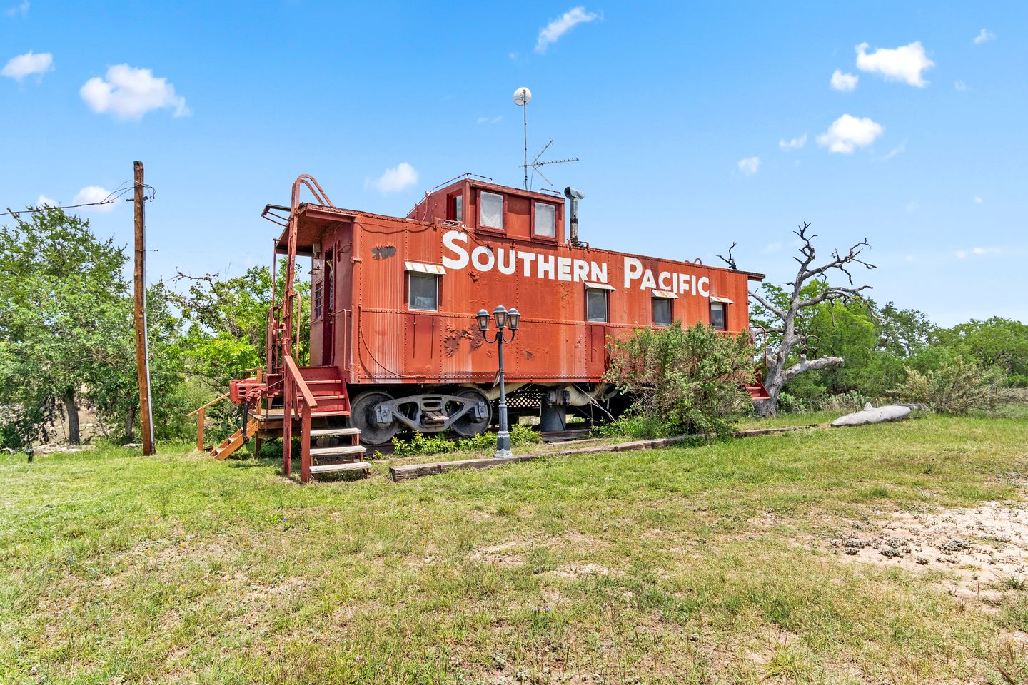 Unique Caboose for an Unforgettable Getaway Along the Medina River with Beautiful Hill Country Views in Bandera, Texas