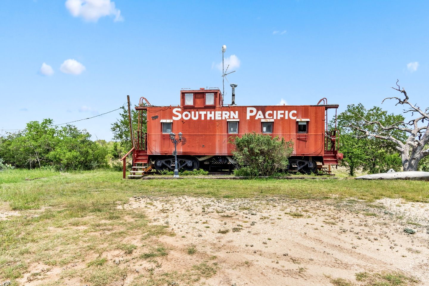 Unique Caboose for an Unforgettable Getaway Along the Medina River with Beautiful Hill Country Views in Bandera, Texas