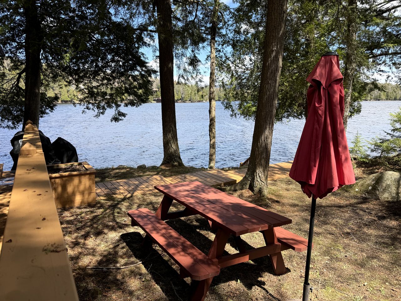 Cozy Cottage Surrounded by Trees with Private Dock for a Peaceful Escape by Big Moose Lake in New York