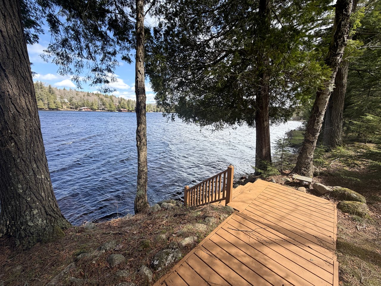 Cozy Cottage Surrounded by Trees with Private Dock for a Peaceful Escape by Big Moose Lake in New York