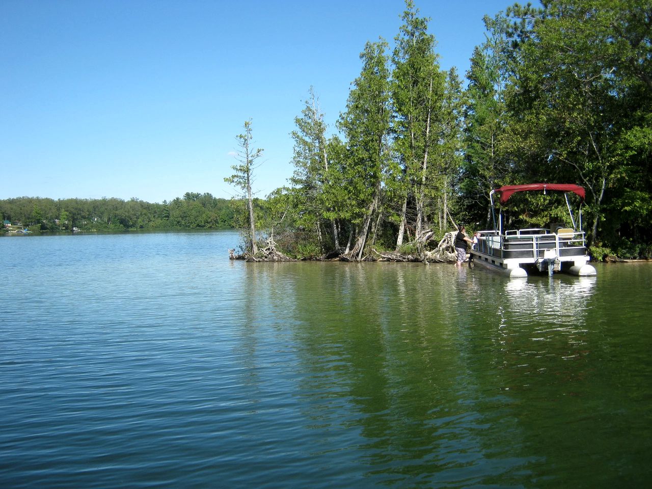 Blissful Lakeside Vacation Home with Pavilion and Dock near Woodland Park in Bitely, Michigan