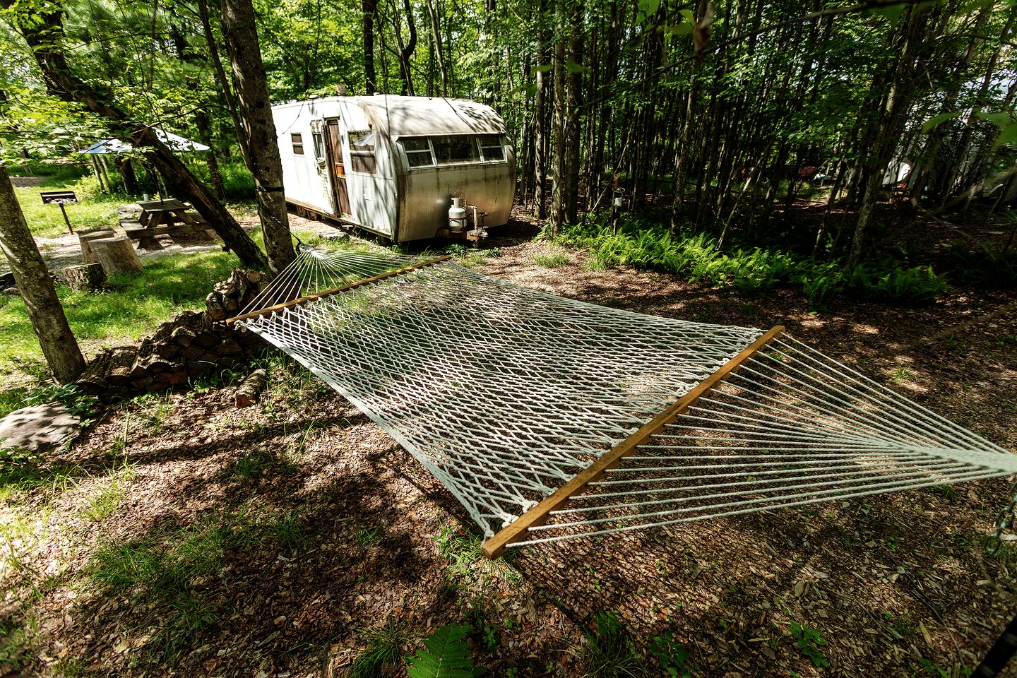 Gorgeous Fully Restored Caravan Nestled in the Trees Along Silver Lake for a Unique Vacation in Woodridge, New York