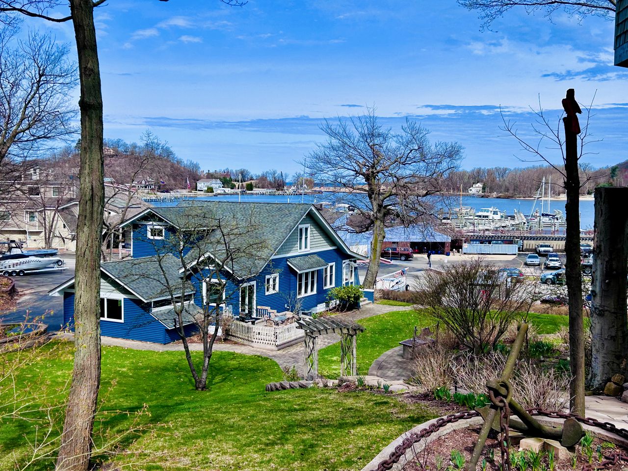 Charming Waterfront Cottage with Modern Remodel Overlooking Lake Macatawa Harbor, Near Macatawa, Michigan