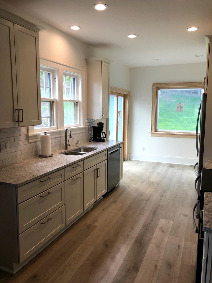 Charming Waterfront Cottage with Modern Remodel Overlooking Lake Macatawa Harbor, Near Macatawa, Michigan