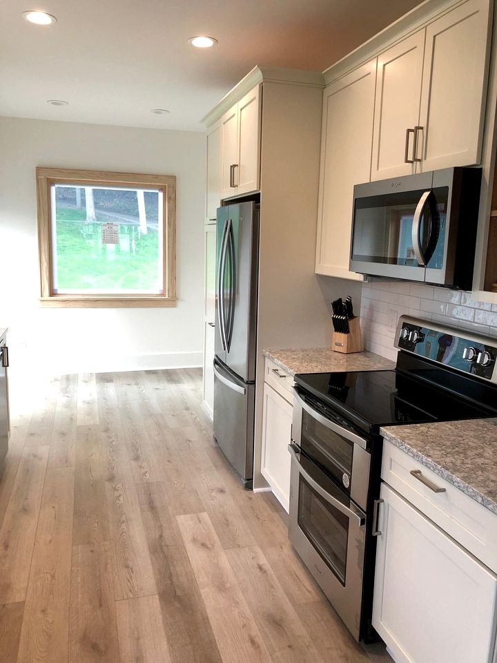 Charming Waterfront Cottage with Modern Remodel Overlooking Lake Macatawa Harbor, Near Macatawa, Michigan