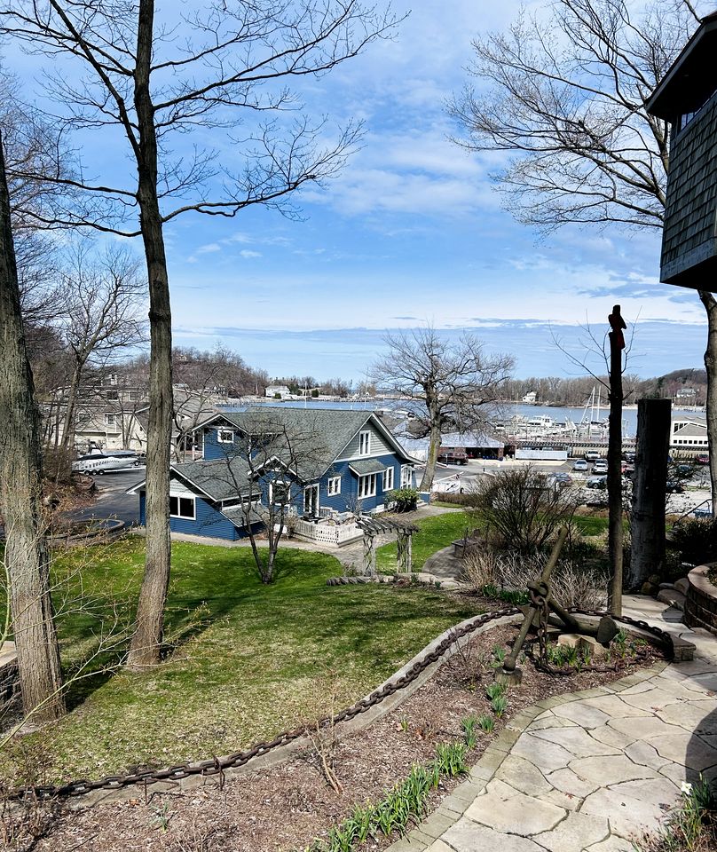 Charming Waterfront Cottage with Modern Remodel Overlooking Lake Macatawa Harbor, Near Macatawa, Michigan