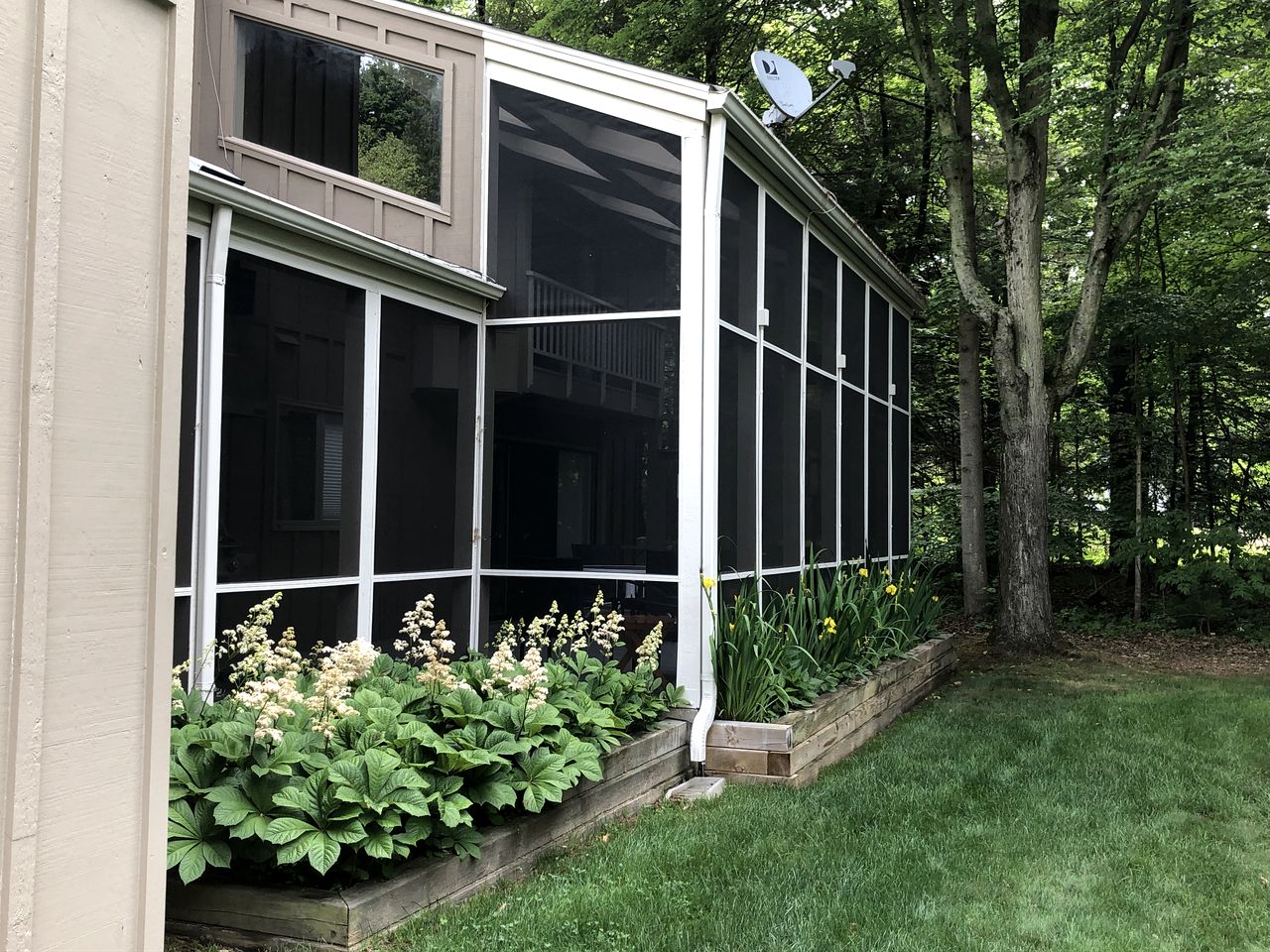 Secluded Woodland Retreat Home with Creekside Deck Near Macatawa Beach in Macatawa, Michigan