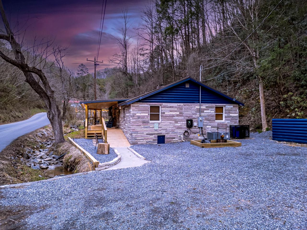 Smoky Mountain Cabin Retreat with Hot Tub, Game Room, Mini Golf & Creek Views in Pigeon Forge, Tennessee