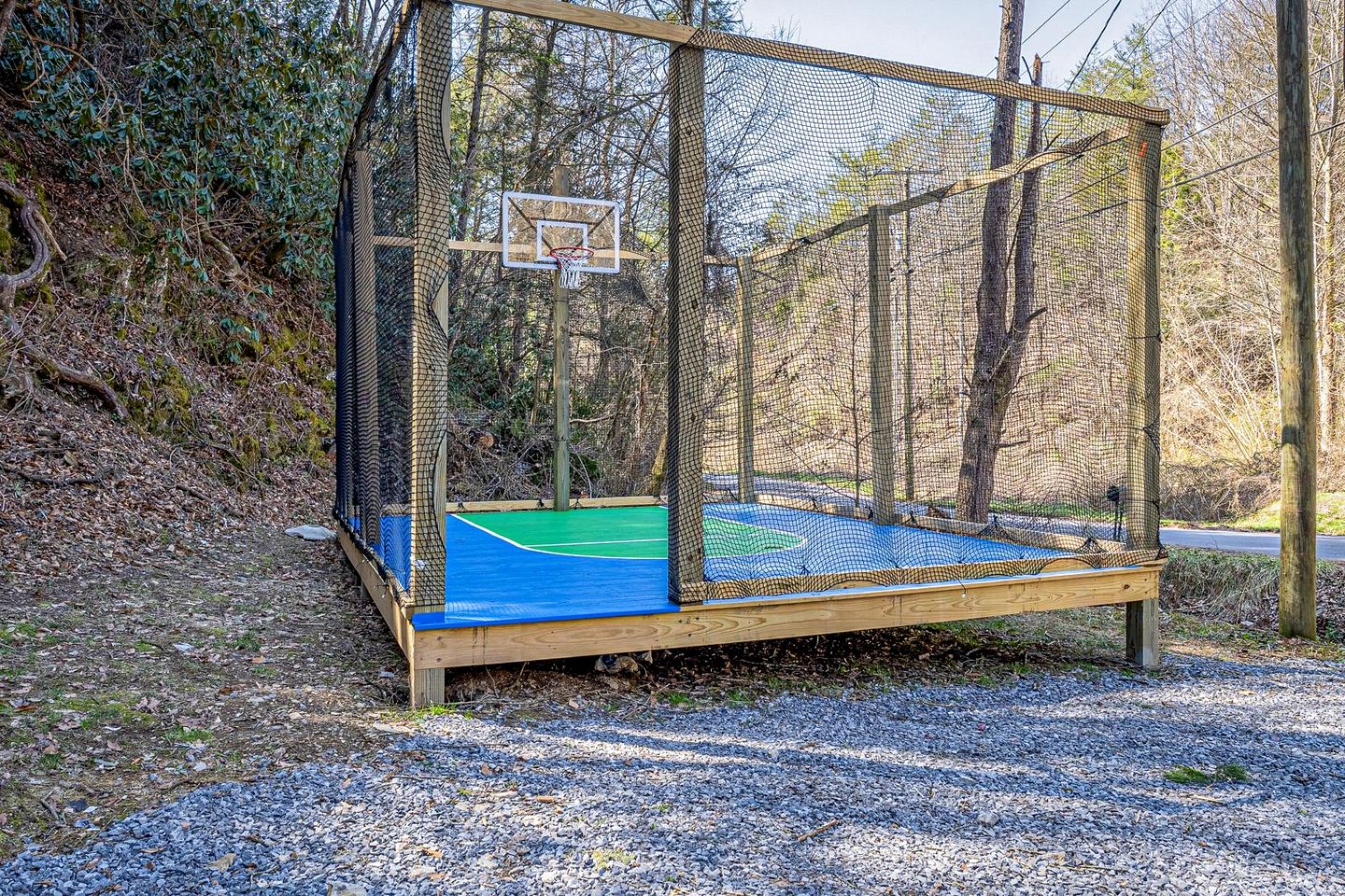 Smoky Mountain Cabin Retreat with Hot Tub, Game Room, Mini Golf & Creek Views in Pigeon Forge, Tennessee