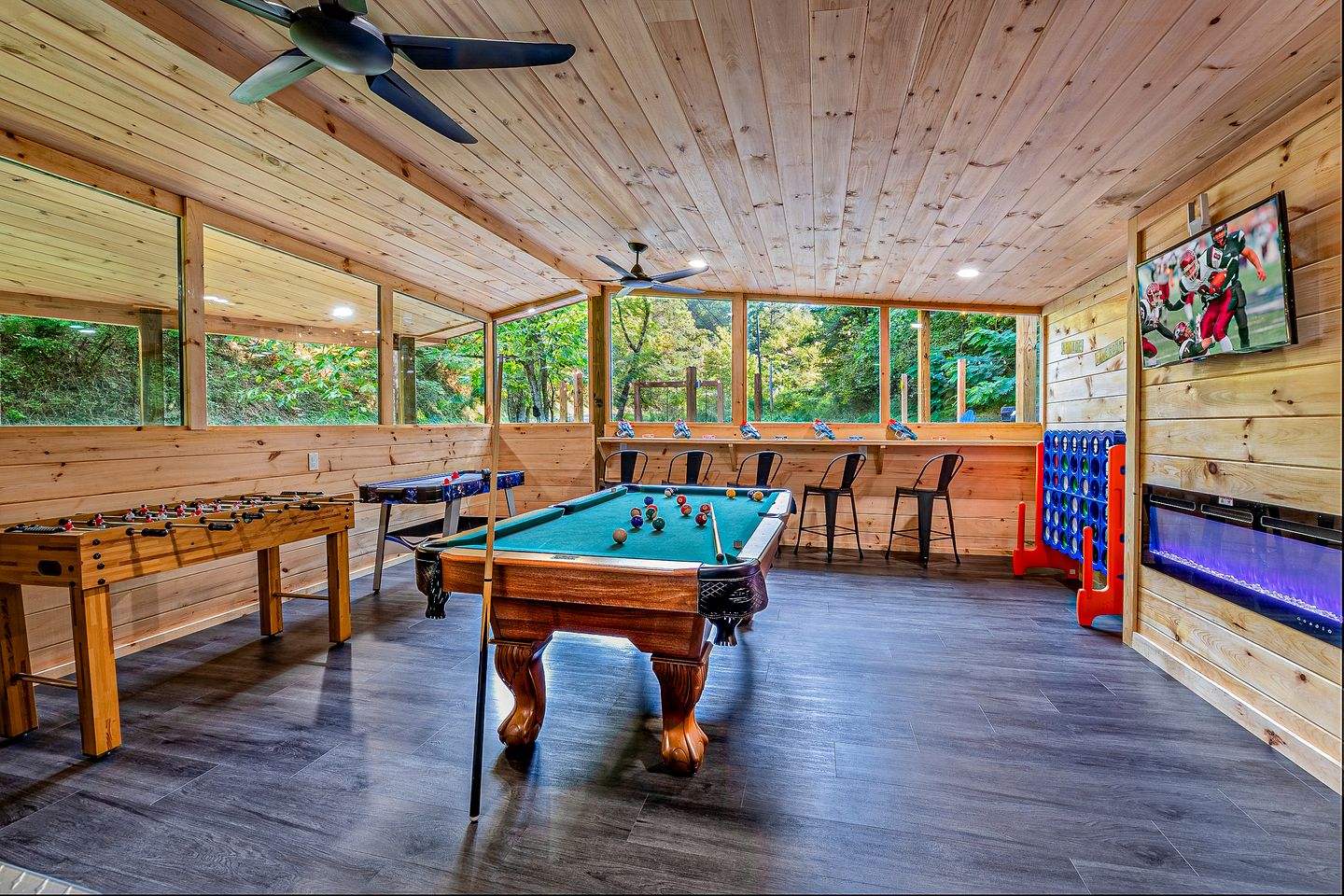Smoky Mountain Cabin Retreat with Hot Tub, Game Room, Mini Golf & Creek Views in Pigeon Forge, Tennessee