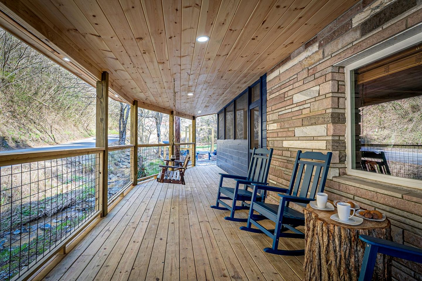 Smoky Mountain Cabin Retreat with Hot Tub, Game Room, Mini Golf & Creek Views in Pigeon Forge, Tennessee