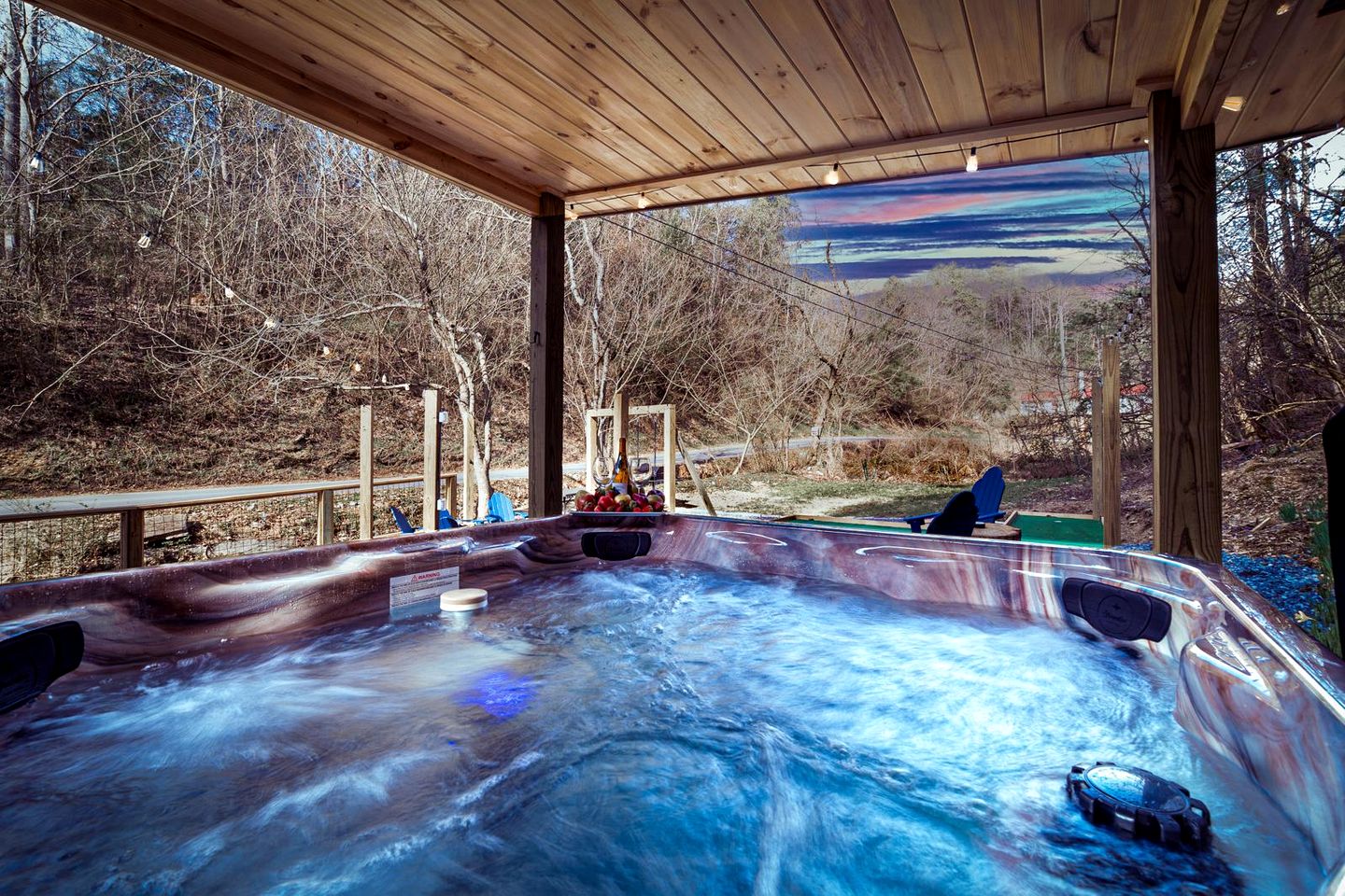 Smoky Mountain Cabin Retreat with Hot Tub, Game Room, Mini Golf & Creek Views in Pigeon Forge, Tennessee