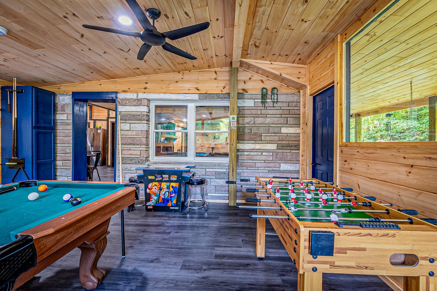 Smoky Mountain Cabin Retreat with Hot Tub, Game Room, Mini Golf & Creek Views in Pigeon Forge, Tennessee