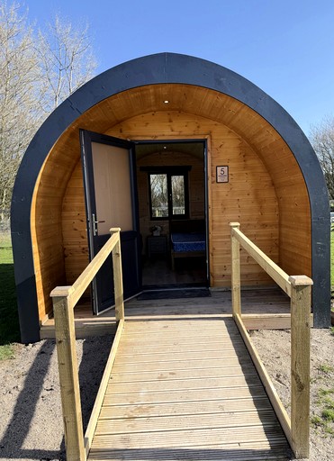 Cozy Accessible Camping Pod with Fire Pit in England, United Kingdom | Pods (Preston, England, United Kingdom)