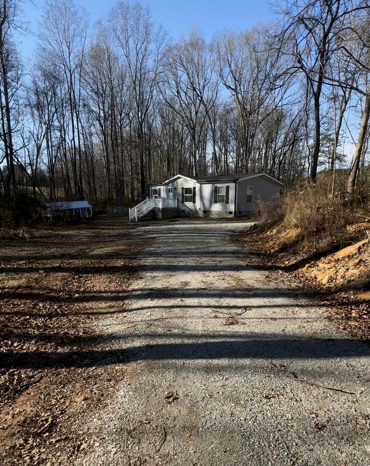 Peaceful Farmstead Cottage with Creekside Views Near Iron Station, North Carolina