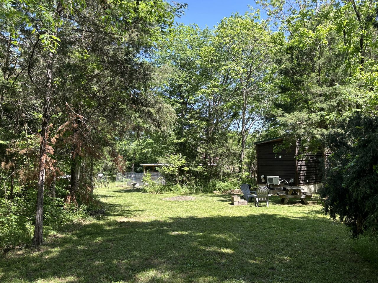 Peaceful Tiny Cabin Escape with Loft, Private Trail & Forest Views in Columbia, Tennessee