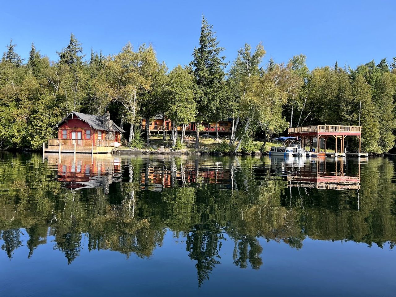 Secluded Waterfront Estate with Boathouse & Panoramic Views in Lake Placid, New York