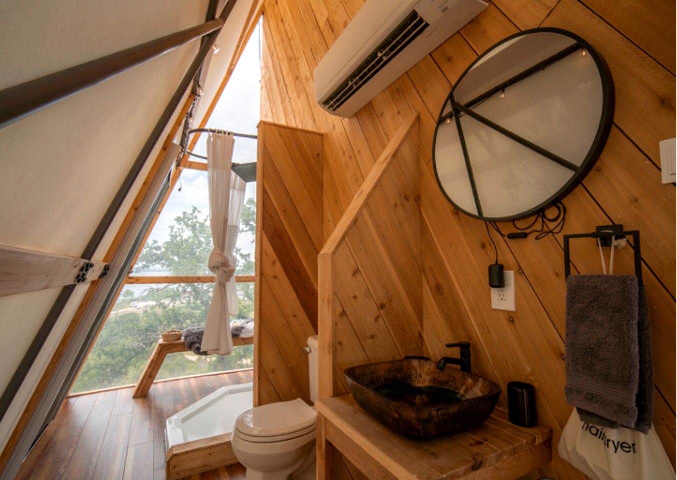 Luxury Glass A-Frame Escape with Cliffside Balcony & Spa Features in Cottonwood Shores, Texas