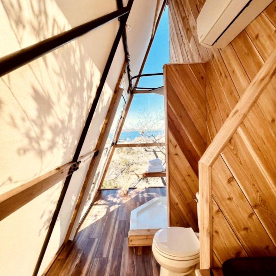 Luxury Glass A-Frame Escape with Cliffside Balcony & Spa Features in Cottonwood Shores, Texas