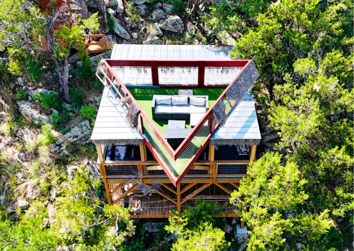 Epic Treehouse Escape with Multi-Level Deck & Hanging Bed in Cottonwood, Texas
