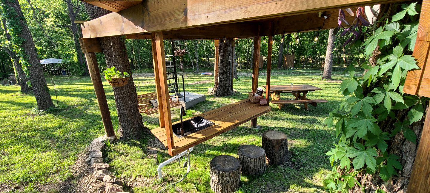 Tree House Glamping Destination near the Ozarks, with River Access for Swimming and Fishing