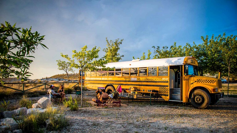 Converted bus accommodation for glamping in Italy