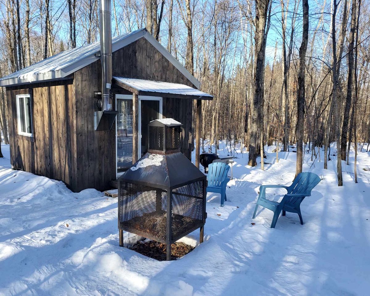 Rustic Escapes to the Canadian Wilderness in this Cozy Cabin for Two in Saint-Damien, Quebec