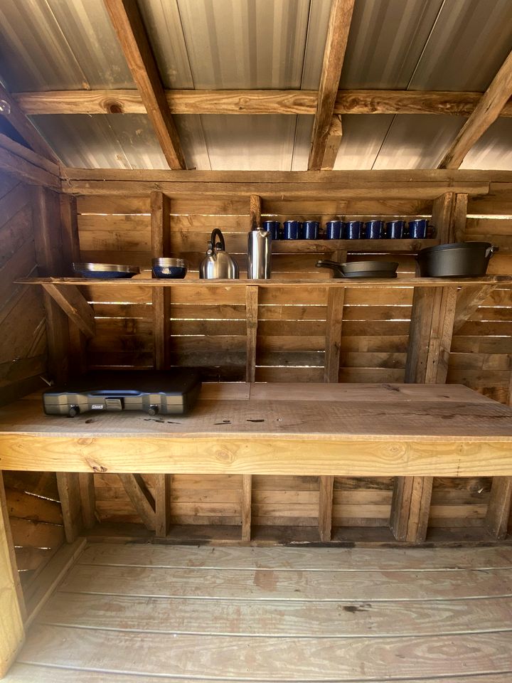 Unique Barnwood Cabin Retreat with Fire Pit and Outdoor Adventure in Zirconia, North Carolina