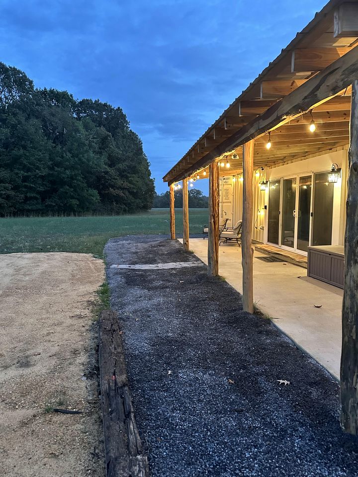 Charming Container Home with Hot Tub near Sardis Lake, Perfect for a Romantic Glamping Getaway