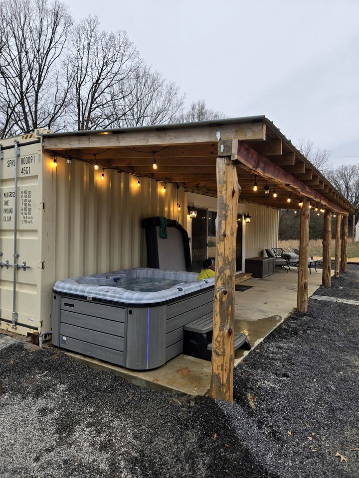 Charming Container Home with Hot Tub near Sardis Lake, Perfect for a Romantic Glamping Getaway