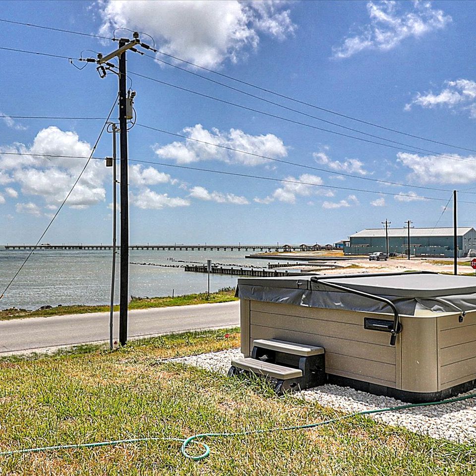 Luxurious Bayfront Getaway with Private Hot Tub and Balcony Views in Fulton, TX