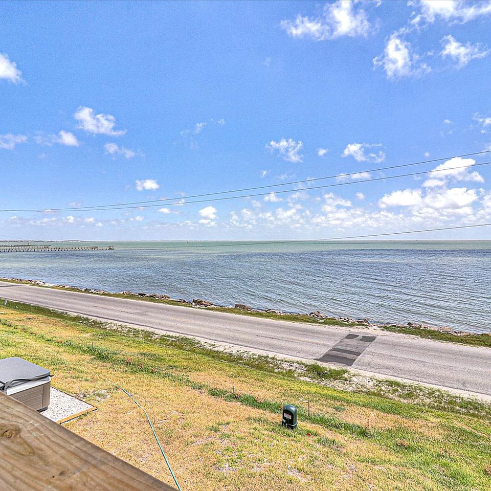 Luxurious Bayfront Getaway with Private Hot Tub and Balcony Views in Fulton, TX