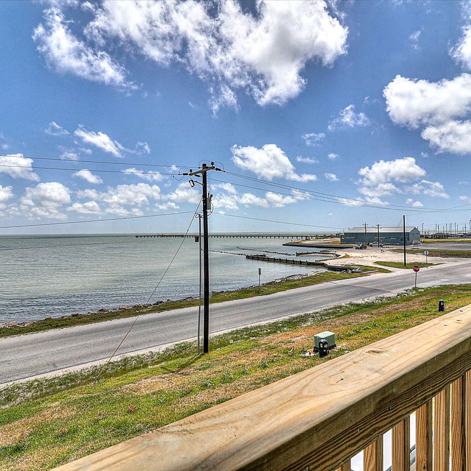 Luxurious Bayfront Getaway with Private Hot Tub and Balcony Views in Fulton, TX