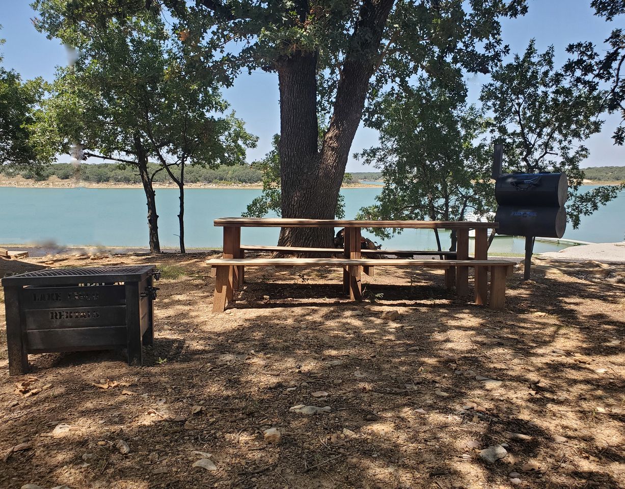 Charming Lakefront Cabin with Sandy Beach Access & Fire Pit Near Lake Cisco, TX
