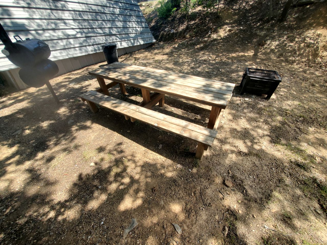 Charming Lakefront Cabin with Sandy Beach Access & Fire Pit Near Lake Cisco, TX