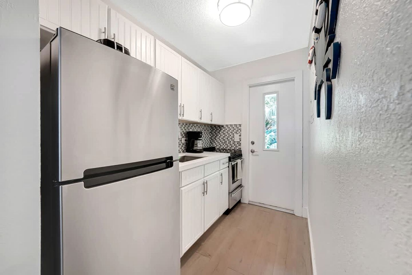 Charming Coastal Retreat with Private Courtyard Near Beach & Dining in West Palm Beach, Florida