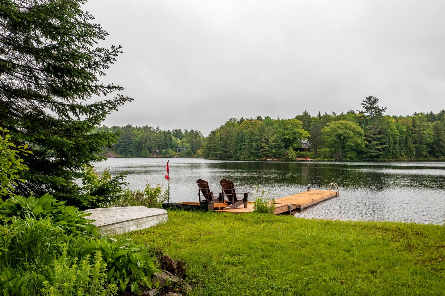Charming Waterfront Cottage with Private Dock on Peaceful Otter Lake near Huntsville, Ontario