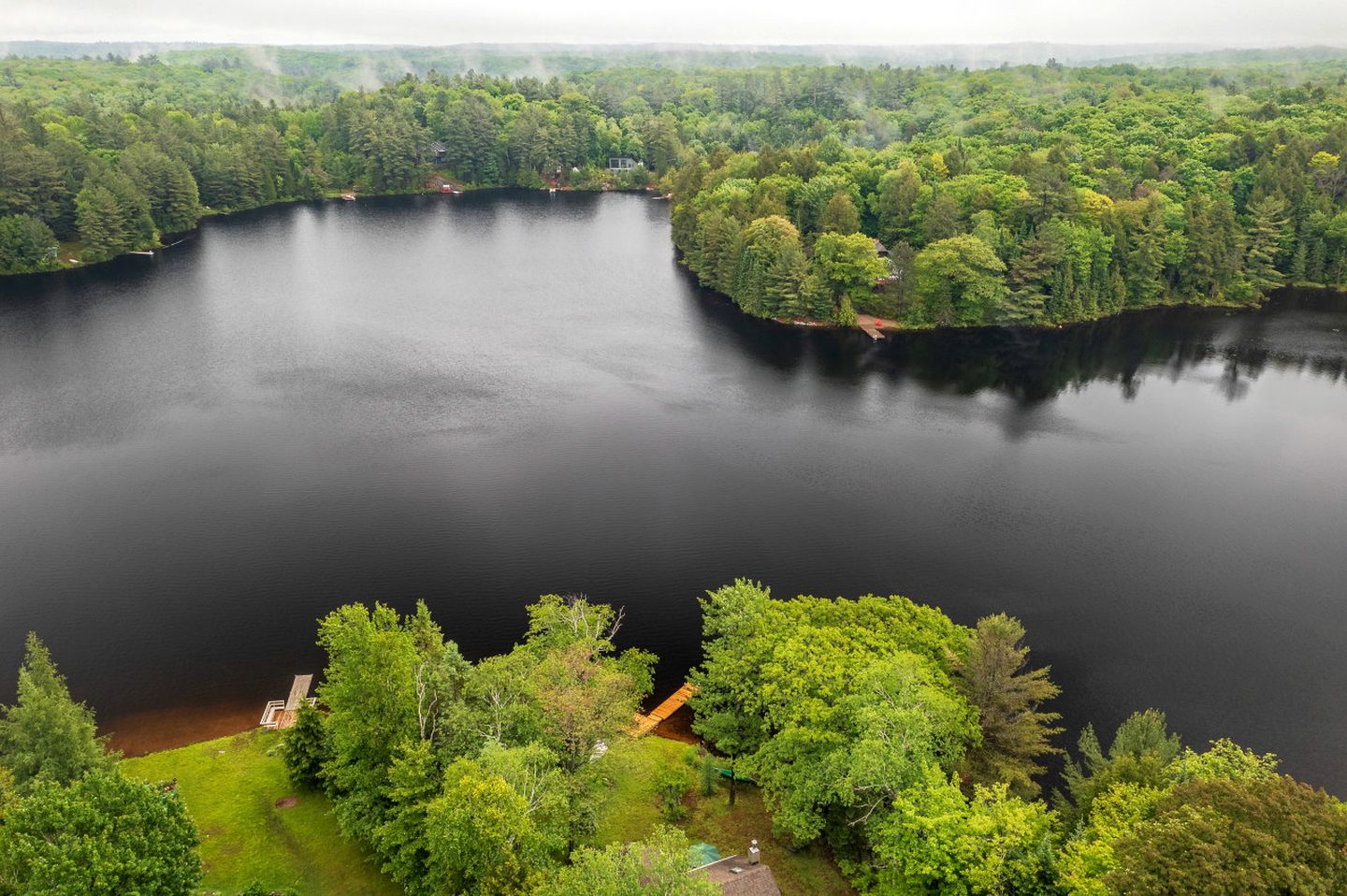 Charming Waterfront Cottage with Private Dock on Peaceful Otter Lake near Huntsville, Ontario