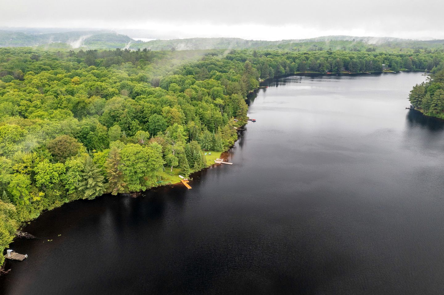 Charming Waterfront Cottage with Private Dock on Peaceful Otter Lake near Huntsville, Ontario