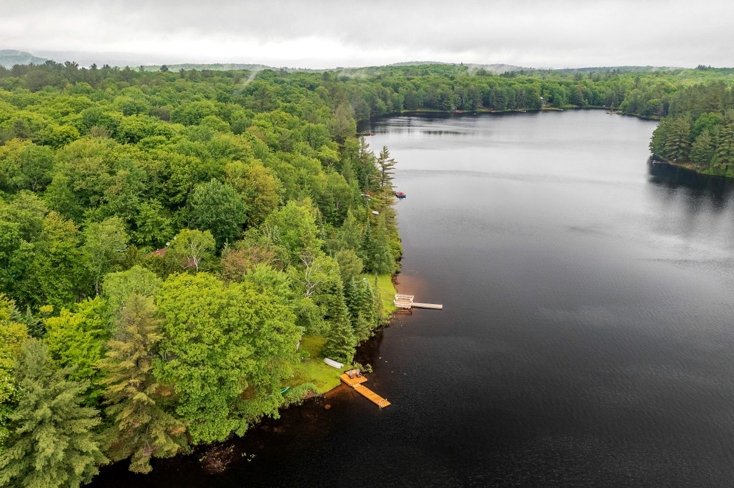 Charming Waterfront Cottage with Private Dock on Peaceful Otter Lake near Huntsville, Ontario