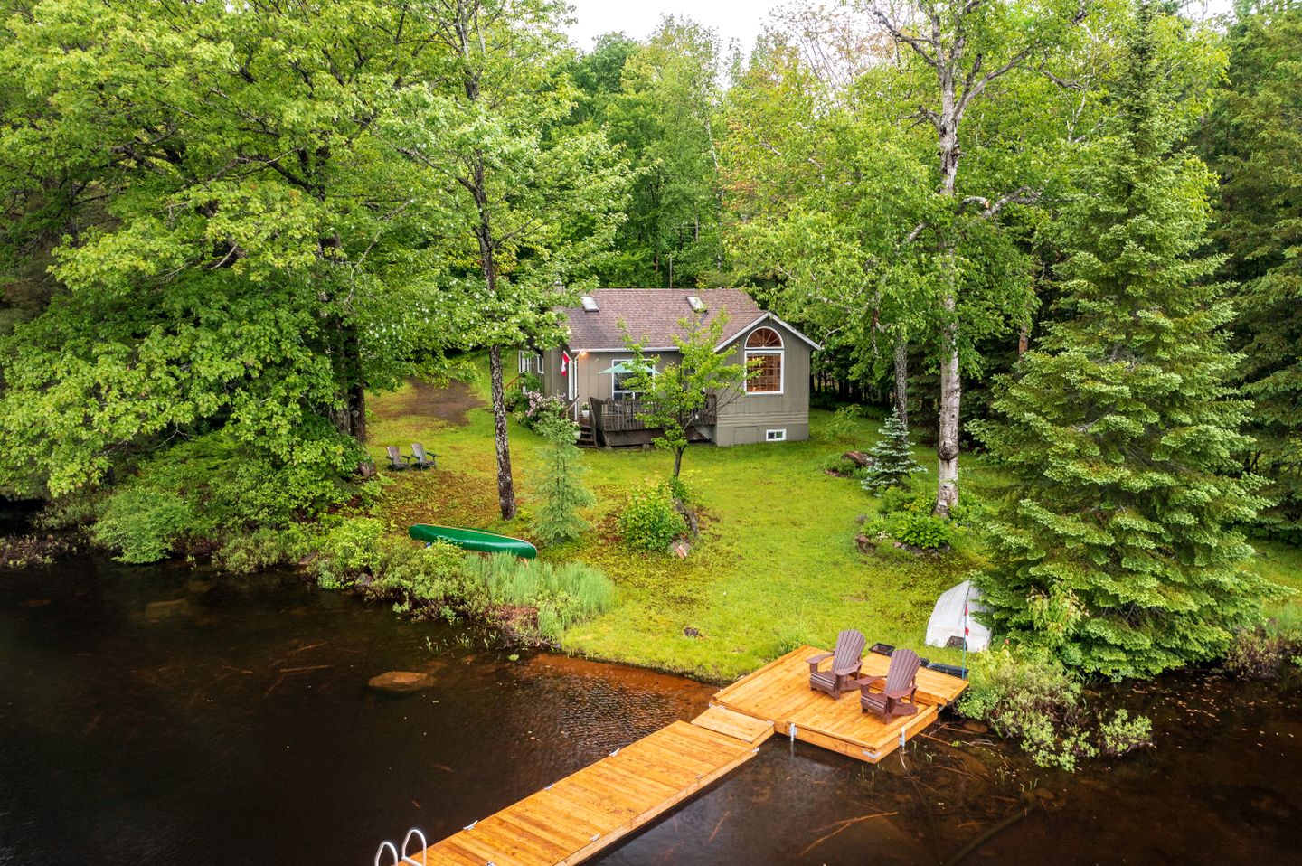 Charming Waterfront Cottage with Private Dock on Peaceful Otter Lake near Huntsville, Ontario