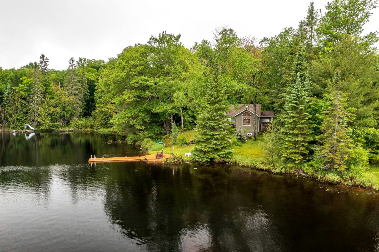 Charming Waterfront Cottage with Private Dock on Peaceful Otter Lake near Huntsville, Ontario
