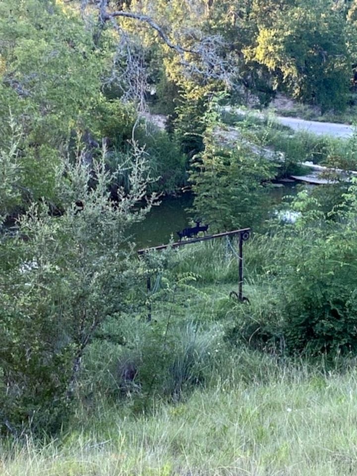 Beautiful Cabin with Deck and Hot Tub Overlooking Spring Creek in Texas
