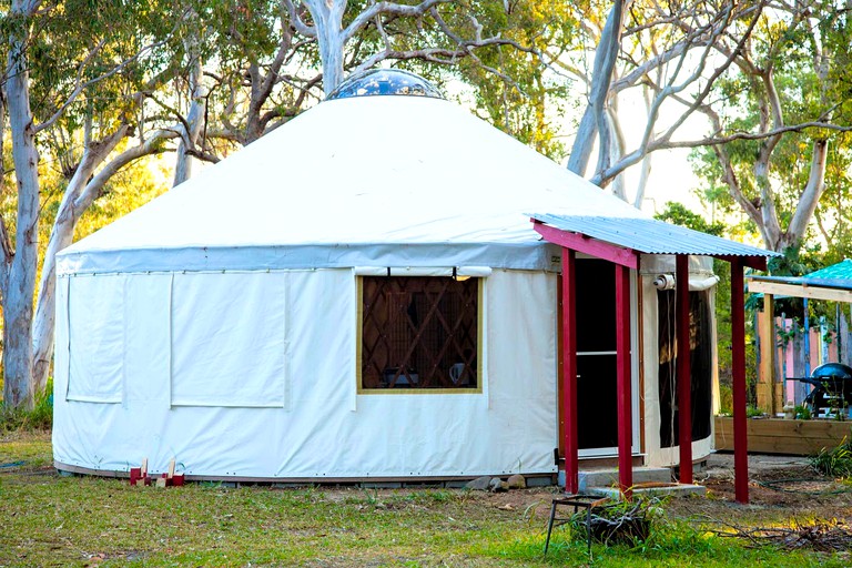 This authentic yurt rental is located on a gorgeous spiritual retreat, perfect for glamping in NSW!