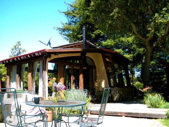 Blue skies over luxury yurts: Big Sur, California