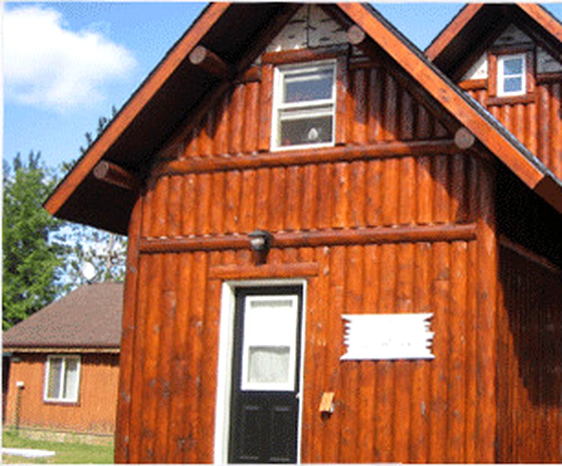 Rustic Lakeside Cabin Rental with a Paddleboat and Canoe in Rhinelander, Wisconsin