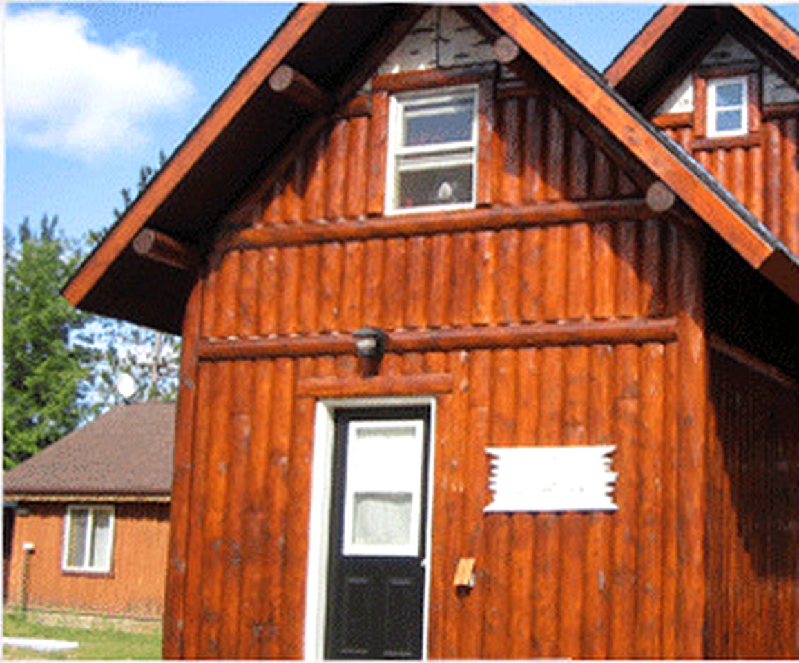 Rustic Lakeside Cabin Rental with a Paddleboat and Canoe in Rhinelander, Wisconsin